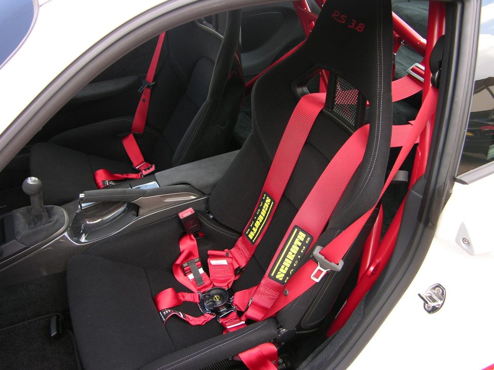 A racing bucket seat and harness
