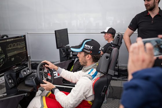A sim racing rig set up at an event